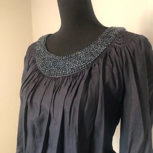 Long sleeve top with beaded embellishments